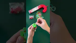 Making a Beadmoji fishtail bracelet with the Michael s exclusive Rainbow Loom candy cane