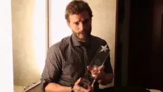 JAMIE DORNAN accepts IMDb s Top 10 Breakout Stars of 2014 Award