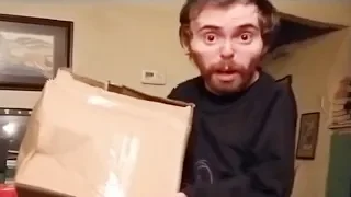 Asmongold opens a box