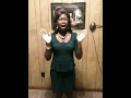 Shatima Felder singing to "God be the glory"