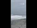Watch as king swells surge over Myrtle Beach turning sidewalks into shorelines