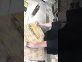 Applying Vinegar and Olive Oil to a Large Sandwich and Wrapping it