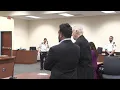 Twelve men arraigned in high-end brothel case