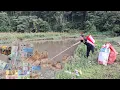 Download Lagu Poor girl collecting trash luckily found a lot of money floating in the water after a heavy rain