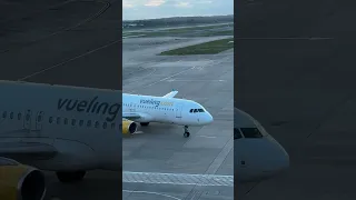 Vueling A320 arriving at London Gatwick Airport