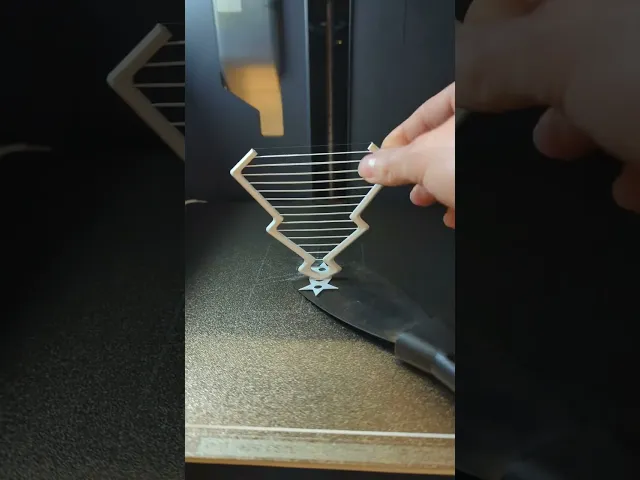 Christmas tree ornament stringing challenge video thumbnail