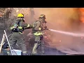 Firefighters Fighting A House Fire
