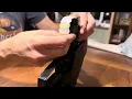 Loading a tape roll into an Avery Dennison CAS Labelling Gun