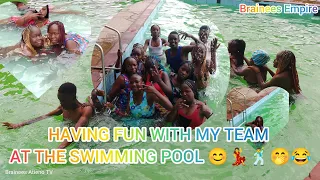 having fun with my team at the swimming pool 