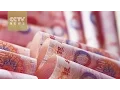 RMB hit record low against US dollars in six years