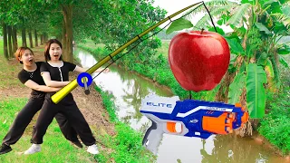 Couple Smart Girl Nerf Guns Go Fishing Dispute Robber Team Apple Battle | Moon Fun TV