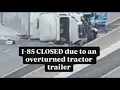 Overturned tractor-trailer closes all lanes of I-85 South in Concord N C