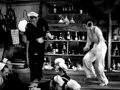 Ruby Keeler and James Cagney Tap Atop a Bar