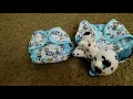 Thirsties duo wraps size 1 and size 2 measurements and on baby
