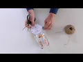 Making micro bit Lanterns Step 5 Threading String 1 of 2