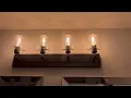 Hampton-Bay Regan 29 13 in 4-Light Expresso Bronze Finish Vanity Light with Clear Glass Shades