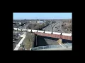 Eastbound sand train with a UP leading at Minneapolis MN on MNDOT traffic cameras 23