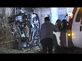 Range Rover heavily damaged after striking large boulder and rolling onto its side driver still