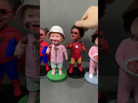 Cute handmade clay kids nodding together.