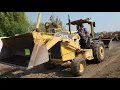 Lot 12 2005 JOHN DEERE 210LE Skip Loader