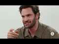 Lili Reinhart vs. Tom Bateman | Hot Ones Versus