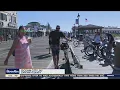 Surfers hit the waves in Ocean City for the Fourth of July