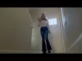 Woman takes her shoes and socks off while babysitting