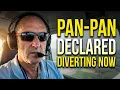 Engine Warning in the climb to FL100 Declaring a PAN in the Cirrus Diversion and Landing