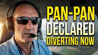 Engine Warning in the climb to FL100 Declaring a PAN in the Cirrus Diversion and Landing