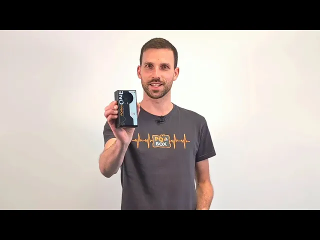 a-Eberle staff member showcasing the PQ-Box ONE Class A socket power quality analyser