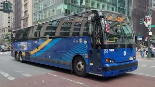 MTA bus 1403 on route Bxm7 passing by