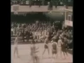 Wilt Chamberlain scores 100 points in a single game