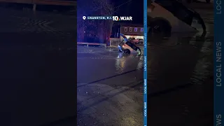 Sinkhole in Cranston swallows car