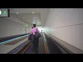 Download Lagu United Arab Emirates, Dubai, ride with automated people mover train, 5X moving walkway, 3X escalator