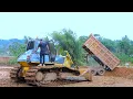 Download Lagu Dump Trucks Unloading Red Soil from Road Construction and Leveled by Bulldozer