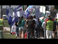 Download Lagu Demonstrators rally against ICE operations in Melrose Park