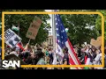 of fraternity brothers guarding US flag highlights campus political divide