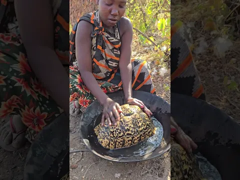 Washing tortoise ready to roast 😋 in the bush