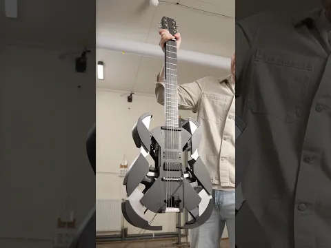 Ukulele that transforms into a guitar mid performance