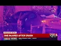 One hospitalized after car crashes into yard near Midtown Omaha