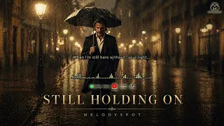  still holding on melodyspot emotional cinematic ballad sad love song 2026