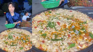 Kind Chinese Guy Cook Free Meals Food for the elders on the Street in a Village Free Dinner
