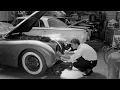 Download Lagu Sean Flynn 1961 With his Jaguar in the Car Workshop