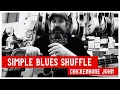 Learning the basics of a simple blues shuffle on Cigar Box Guitar with Chickenbone John