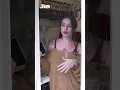 Bikini barista fights back with hammer after customer dumps drinks on her