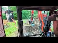 Watch Us tear down this deck with the Kubota KX080-5 Part one
