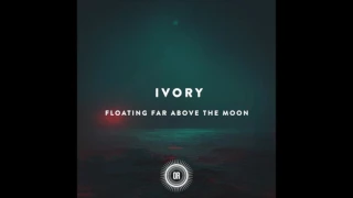 ivory floating far above the moon