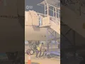 Lagu Airport Worker Falls From Plane at Airport in Indonesia | 10 News First