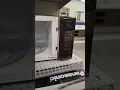 Henry looking at Microwaves at Lowes