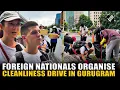 Download Lagu Foreign nationals along with locals organise cleanliness drive to clean roads, drains in Gurugram